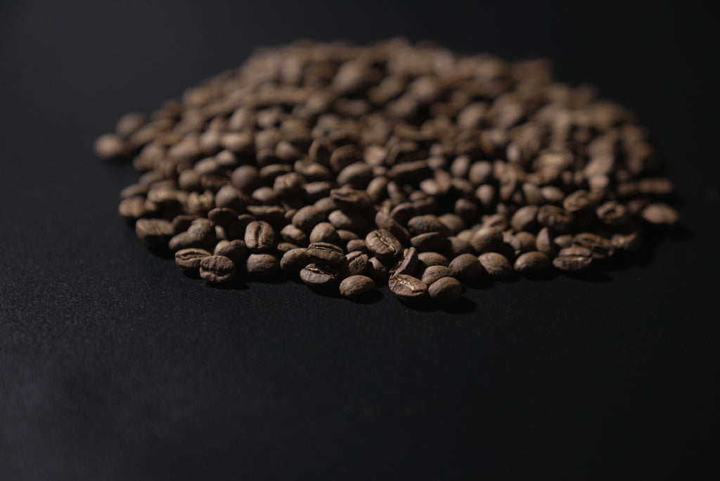 Coffee beans on a black background